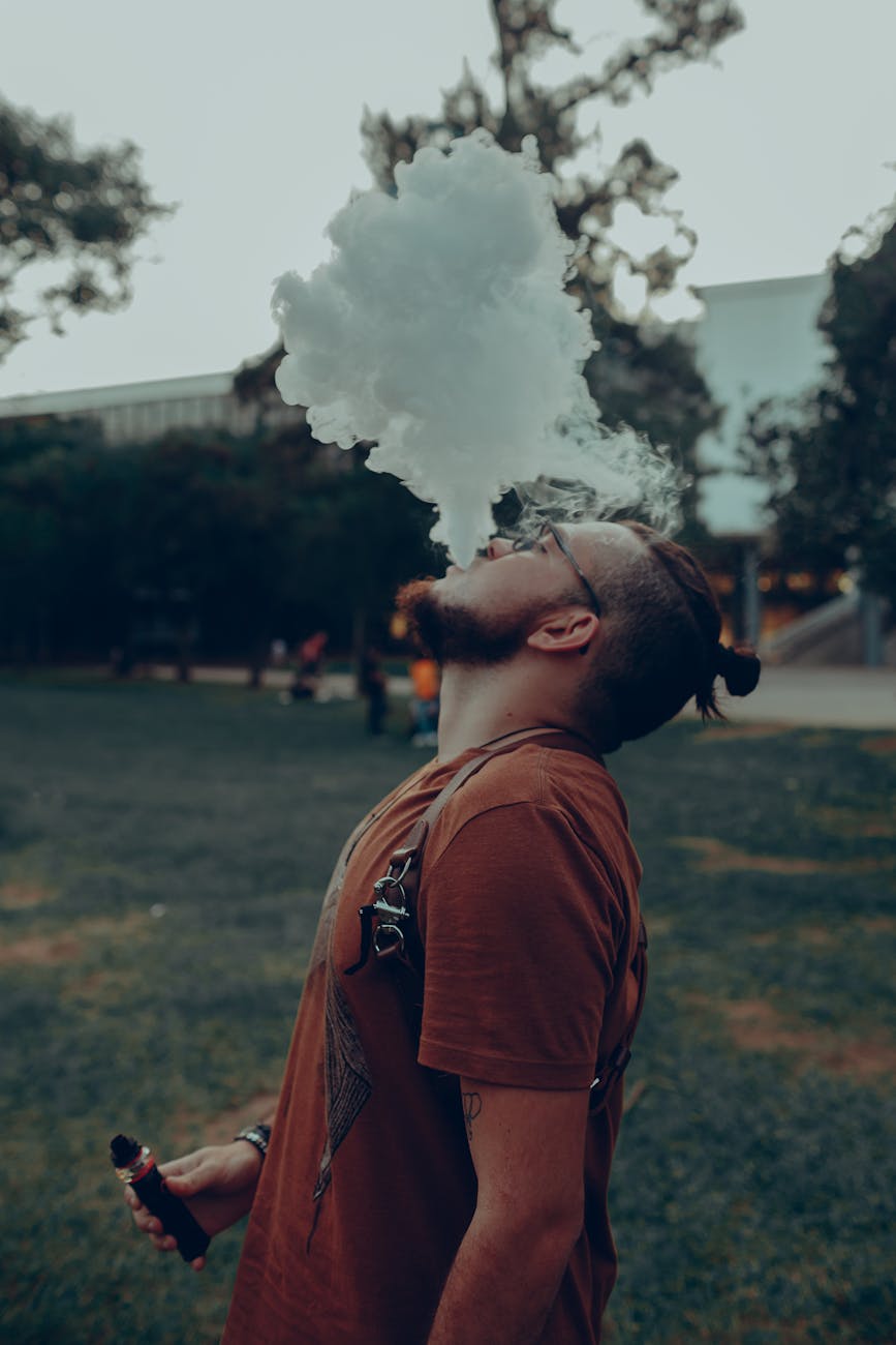 photo of man vaping